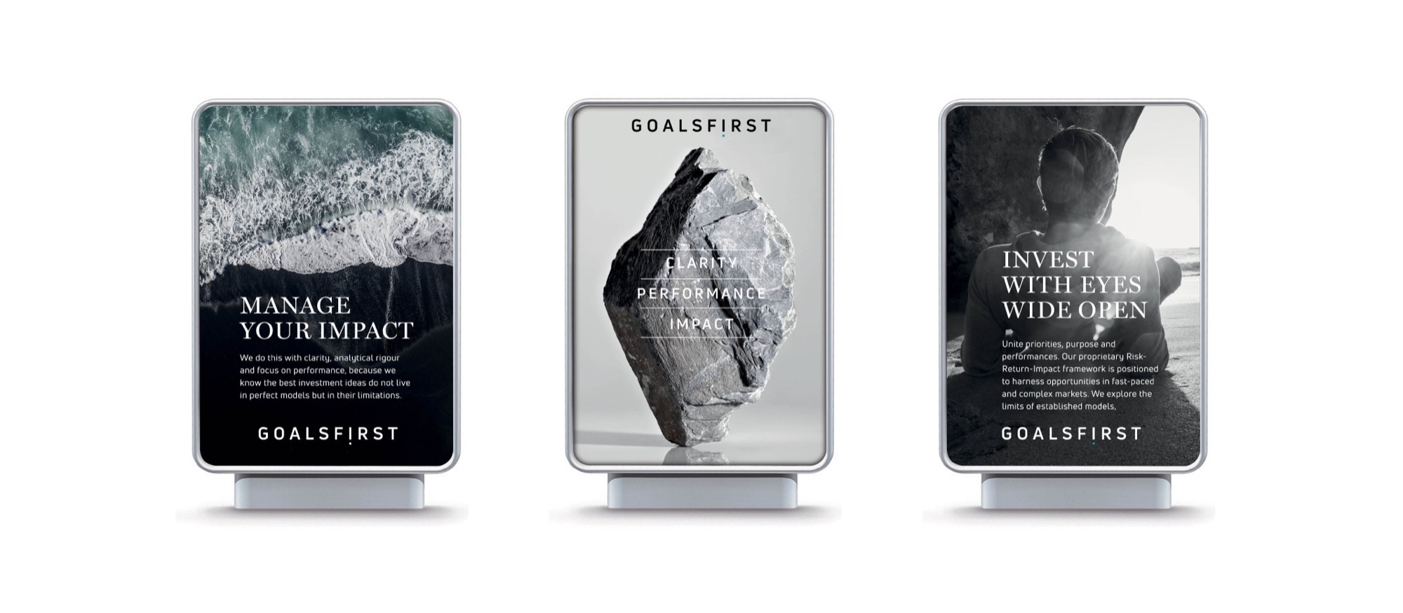 Three illuminated lightbox panels: Manage your impact over breaking surf, the standing stone with Clarity, Performance, Impact, and Invest with eyes wide open over a backlit figure on a beach